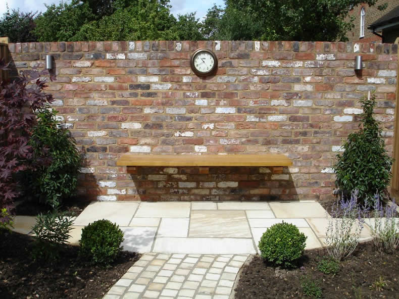 Another example was a floating bench built against a traditional brick wall as the photo demonstrates.