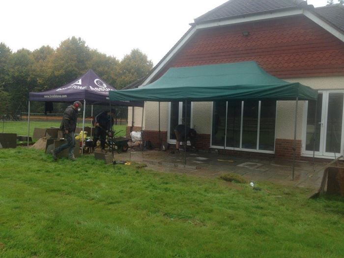 An investment in a large gazebo paid off when the weather turned against us as we started to lay the new paving. The shelter it created enabled us to carry on despite the weather ensuring the build remained on schedule.