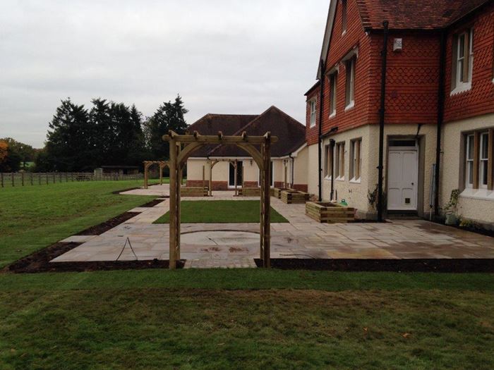 As the garden comes to completion it takes on a formal feel, helped by the use of arches (five in total!) and the impact of a central lawn surrounded by the smaller flower beds and raised beds.