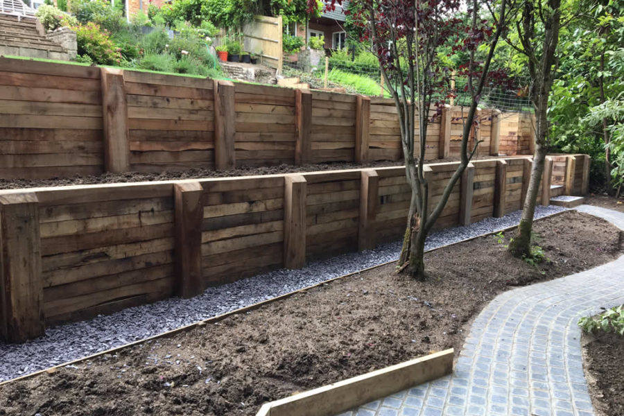 Retaining walls constructed from new oak sleepers