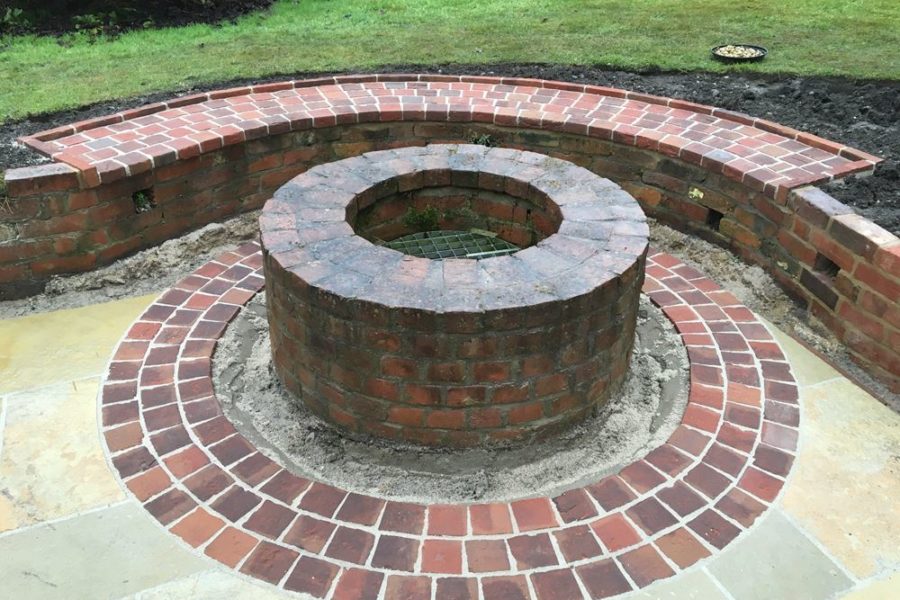 The almost-finished seating area, with the brick pavers pointed in.